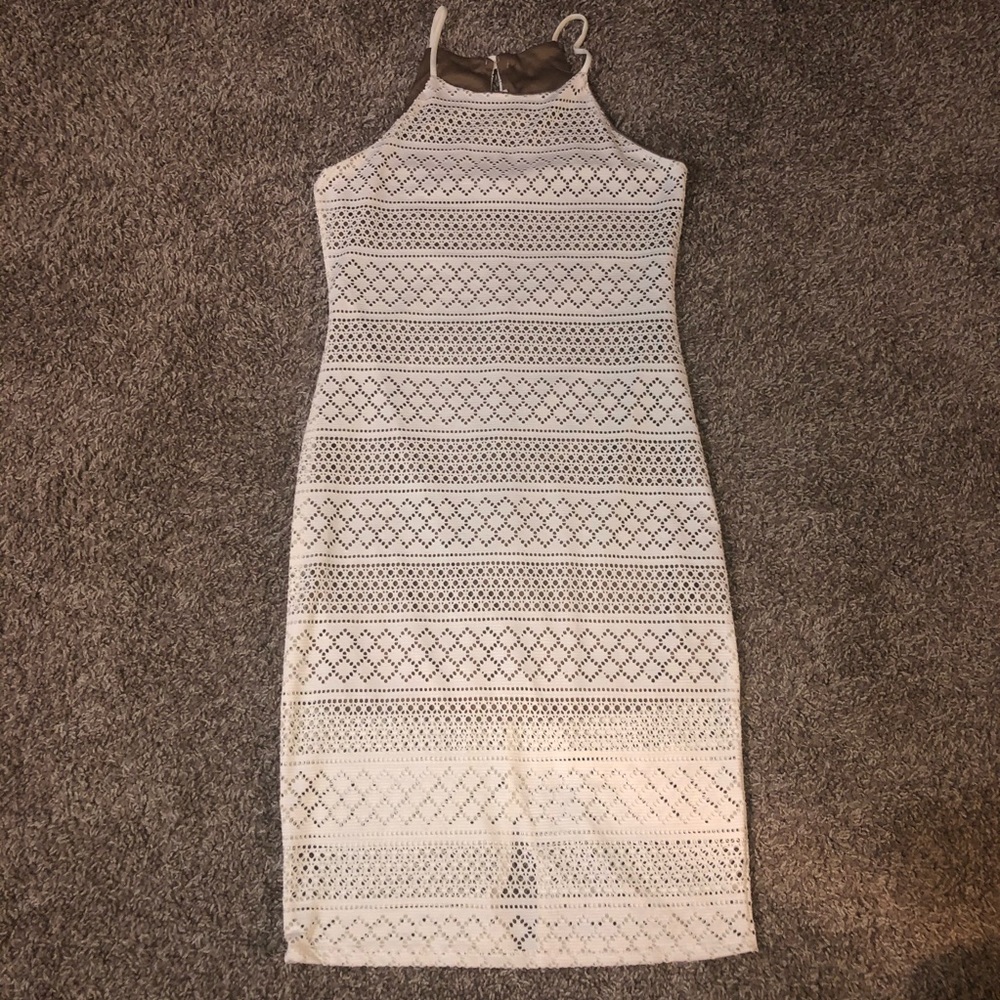Lace dress with nude lining